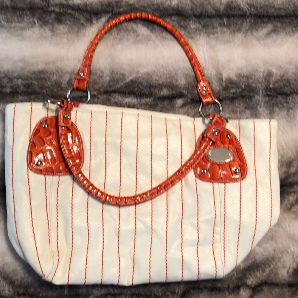 Orange and white purse